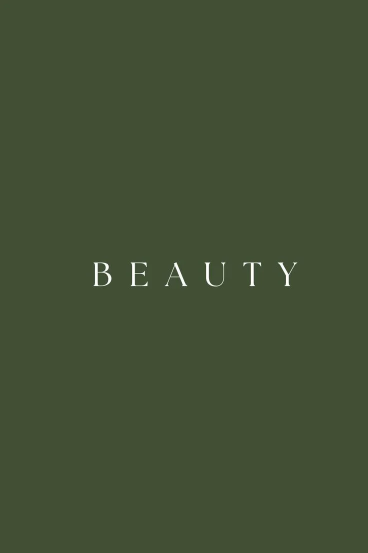 BEAUTY letterspaced type on a forest green panel